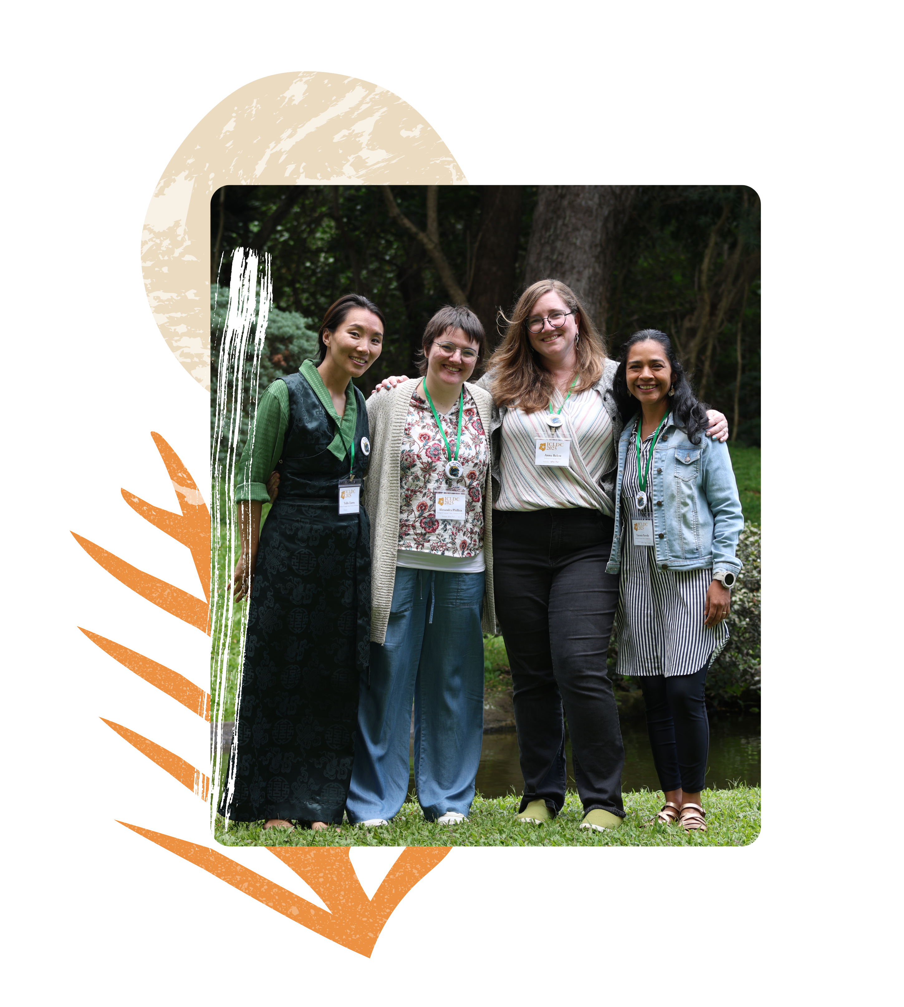 Four women from the ELP staff, standing in a green garden and smiling