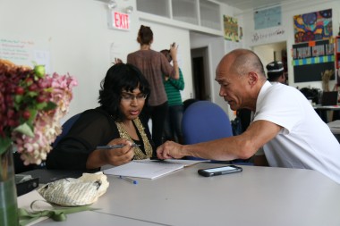 Woman and man w notebook