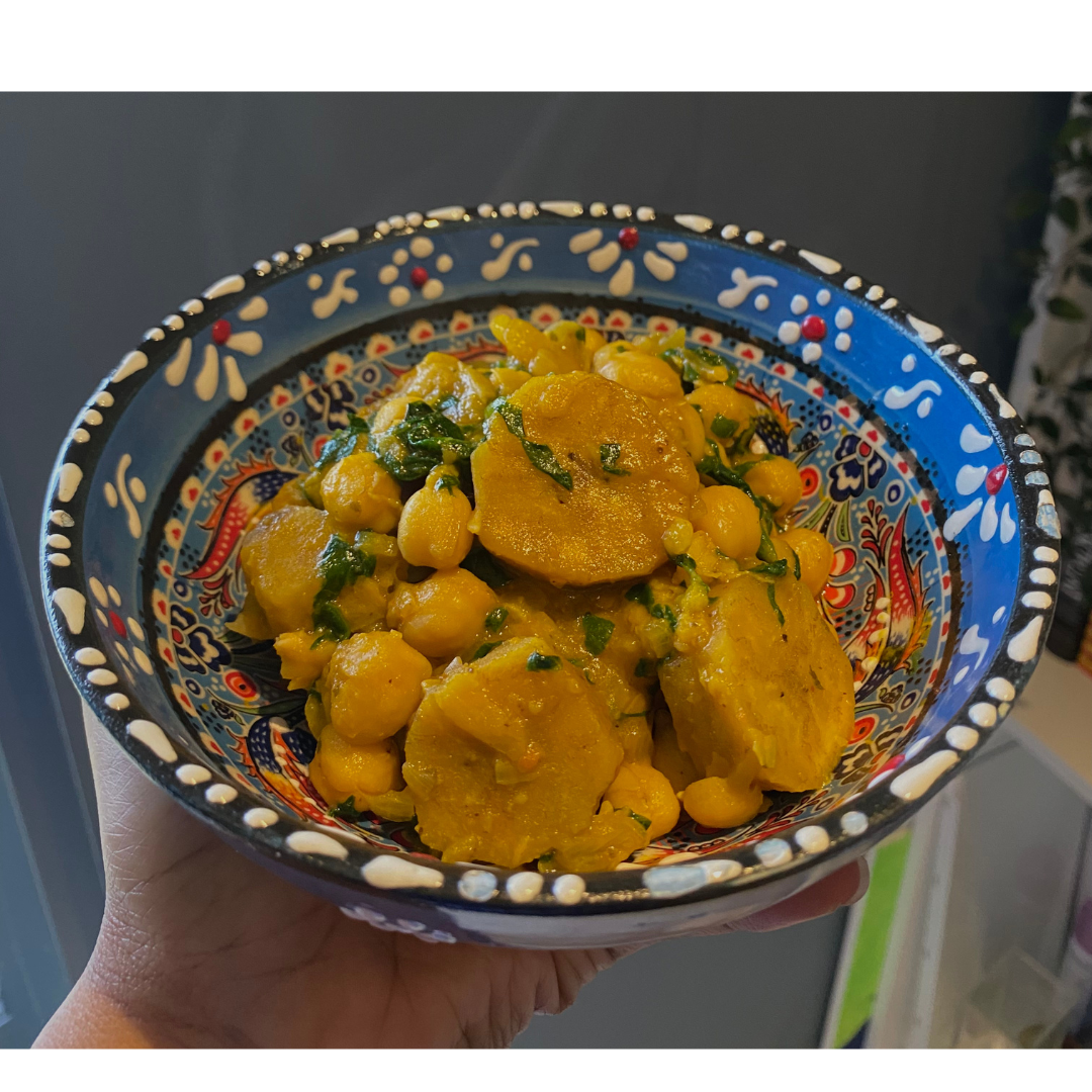 A blue ceramic bowl of vegan kekefiyai